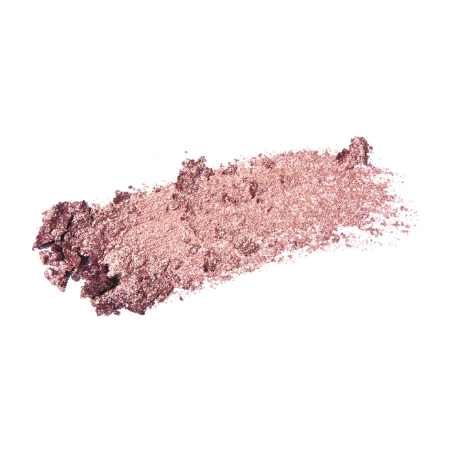 Swatch of a shimmery eyeshadow pigment in a rose gold shade.