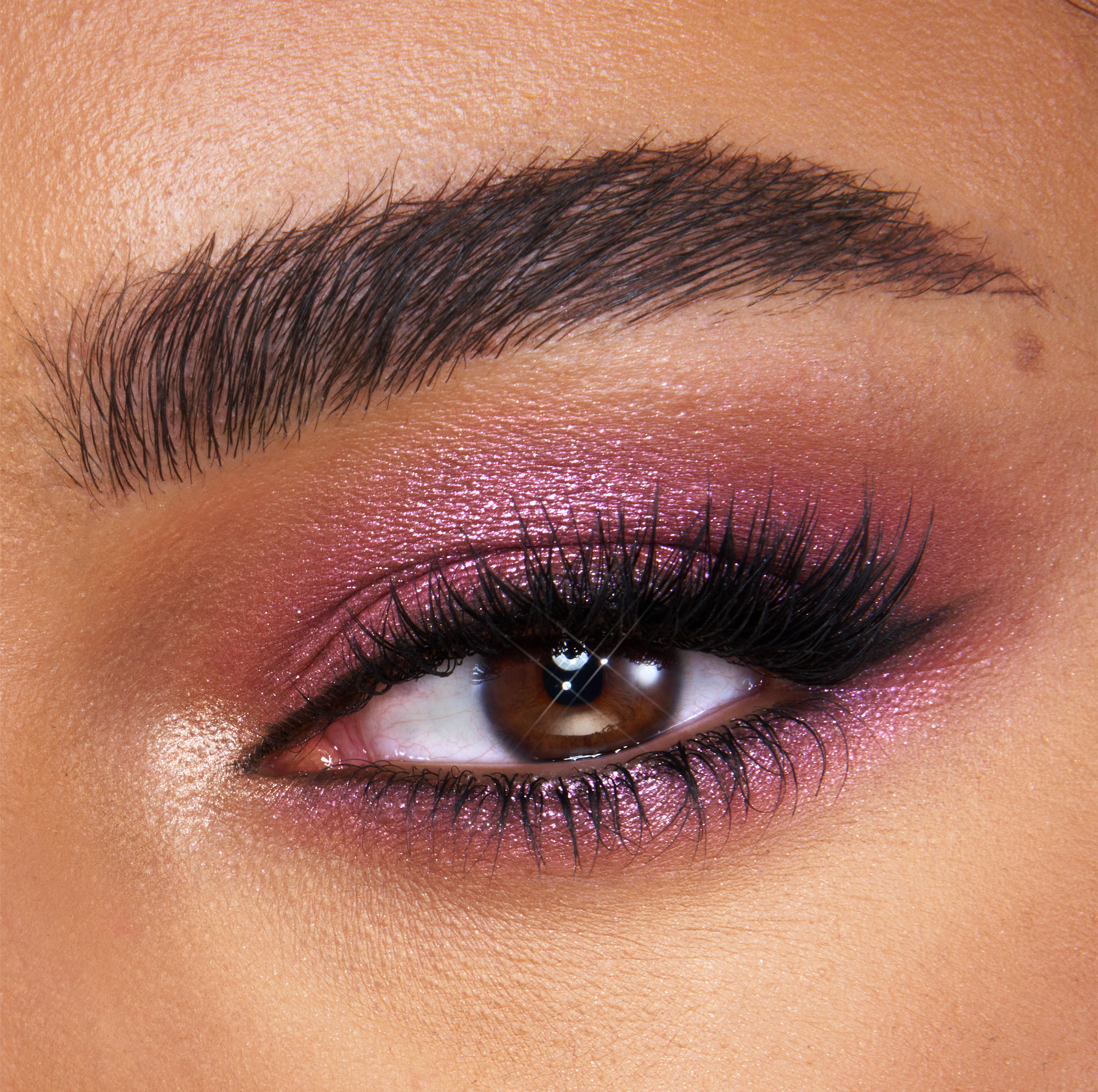 Model eye close up of a purple eye look using the Beautyverse Palette
