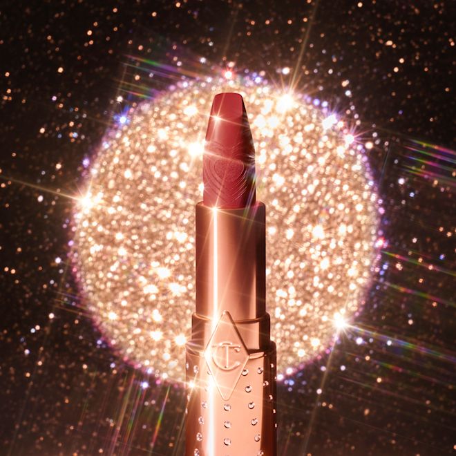 K.I.S.S.I.N.G in Rosy Seduction open An open, satin finish lipstick in a rose pink shade with gold-coloured tube.