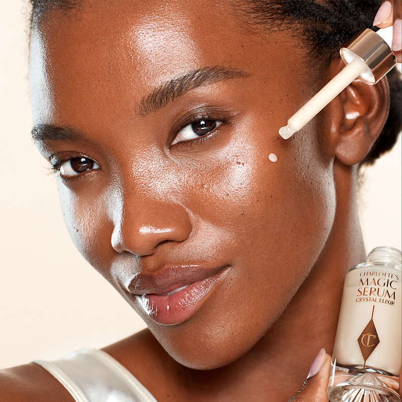 Mae applying face serum before eye patches