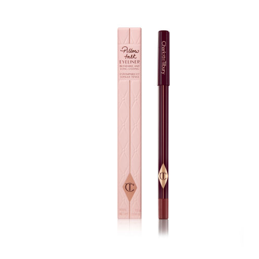 A dark brown eyeliner pencil with its nude-pink coloured box next to it. 