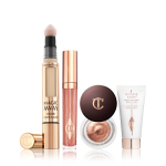 Travel Makeup Bundle Pack shot With Collagen Lip Gloss, Eyes to Mesmerise, Magic Away Concealer and Travel Sized Wonderglow