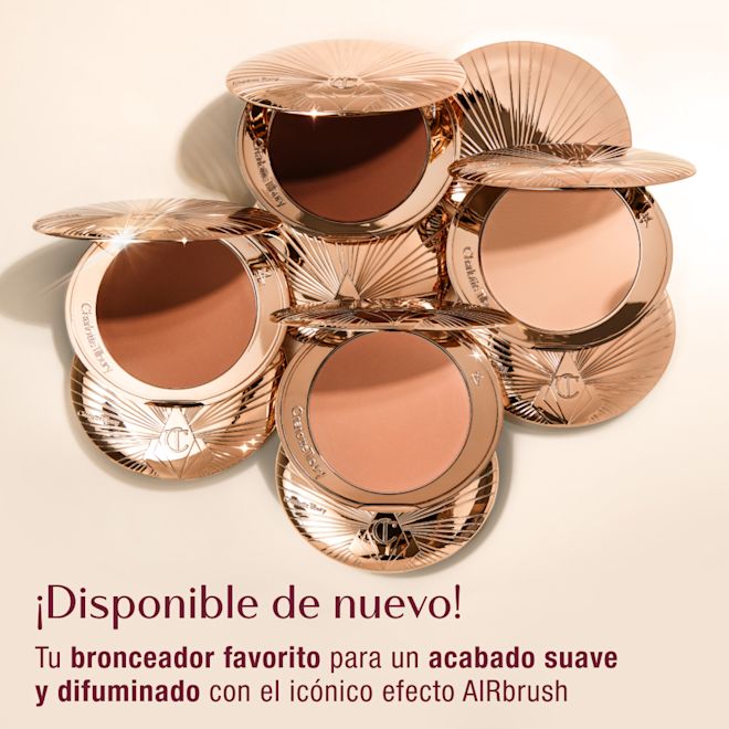 ESUS Bronzer Back In Stock 1000x1000 Five open compacts of Charlotte Tilbury bronzer with rose gold packaging, arranged in a circular pattern. Text reads 'Back In Stock! Your favourite smoothing, blurring bronzer for the iconic AIRbrush effect.