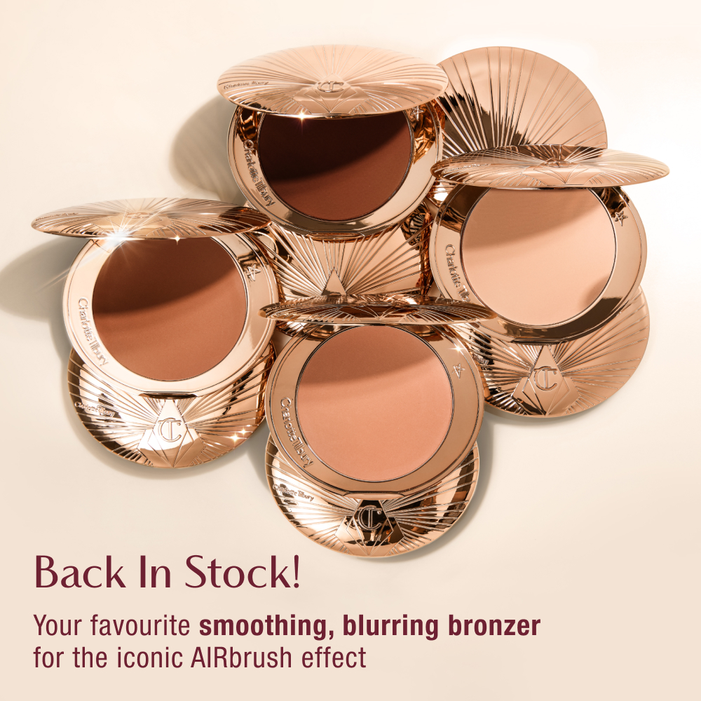 Five open compacts of Charlotte Tilbury bronzer with rose gold packaging, arranged in a circular pattern. Text reads &#x27;Back In Stock! Your favourite smoothing, blurring bronzer for the iconic AIRbrush effect.