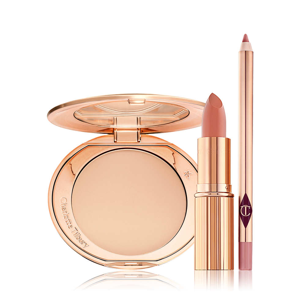 An open, mirrored-lid powder compact in a light shade, an open lipstick in a nude peach shade, and an open lip liner pencil in a warm pink shade.