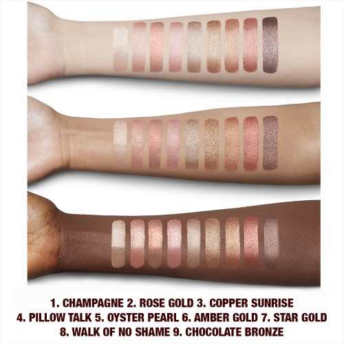 Fair, light, tan, and deep-tone arms with swatches of extremely pigmented cream eyeshadows with a metallic finish in shades of pink, gold, brown, peach, silver, purple, and bronze. 