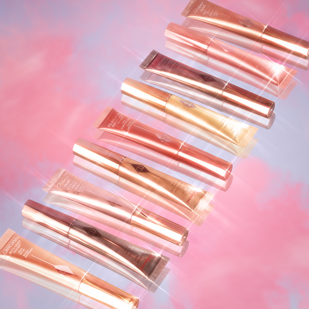 Line up of illuminating Beauty Light Wand liquid blush and highlighters