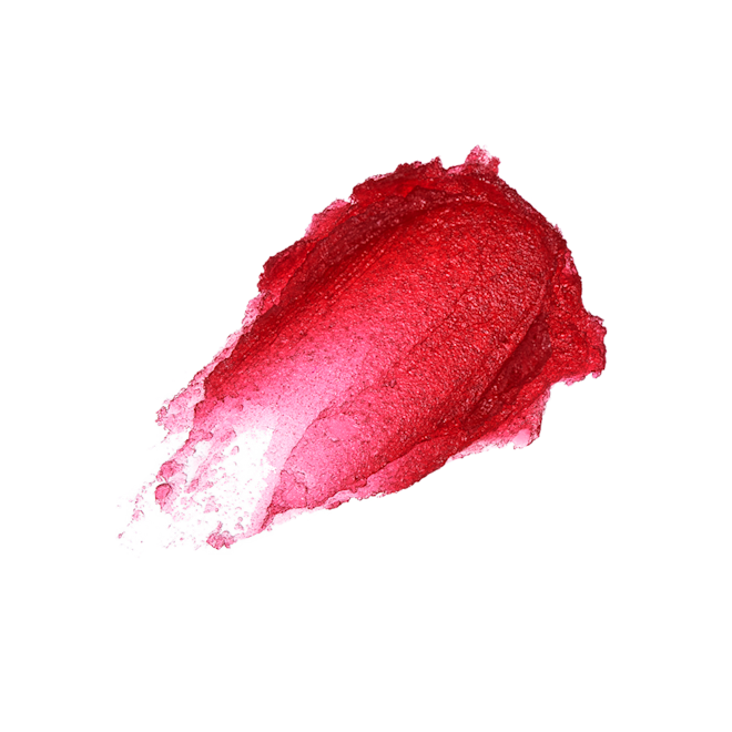 Glowgasm Lips in Jewelgasm swatch Swatch of a glowy nude red sheer lipstick.