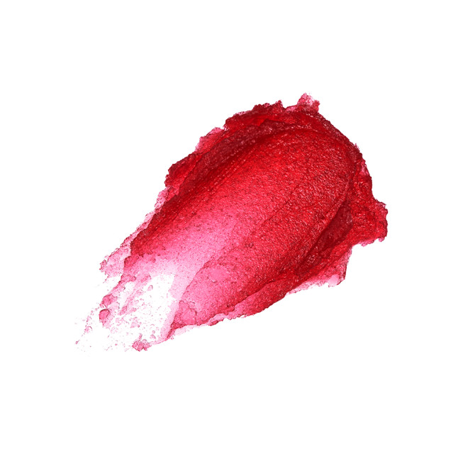Swatch of a glowy nude red sheer lipstick. 