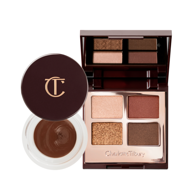 An open eyeshadow pot with a dark, chocolate-brown cream shadow with a matte finish inside with its lid next to it, and an open quad eyeshadow palette with a mirrored-lid with matte and shimmery eyeshadows in shades of gold, brown, and champagne.