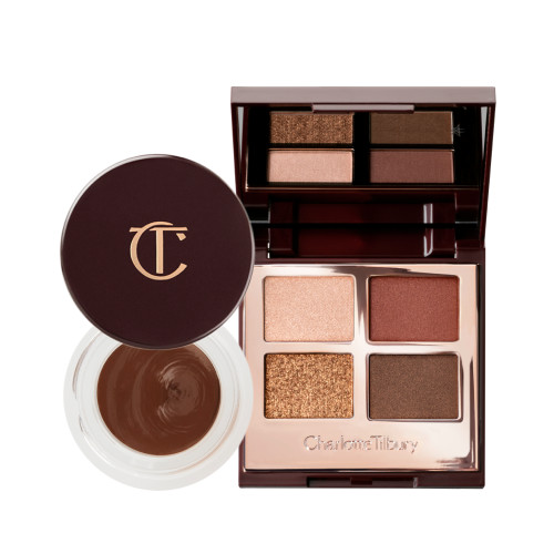 An open eyeshadow pot with a dark, chocolate-brown cream shadow with a matte finish inside with its lid next to it, and an open quad eyeshadow palette with a mirrored-lid with matte and shimmery eyeshadows in shades of gold, brown, and champagne.