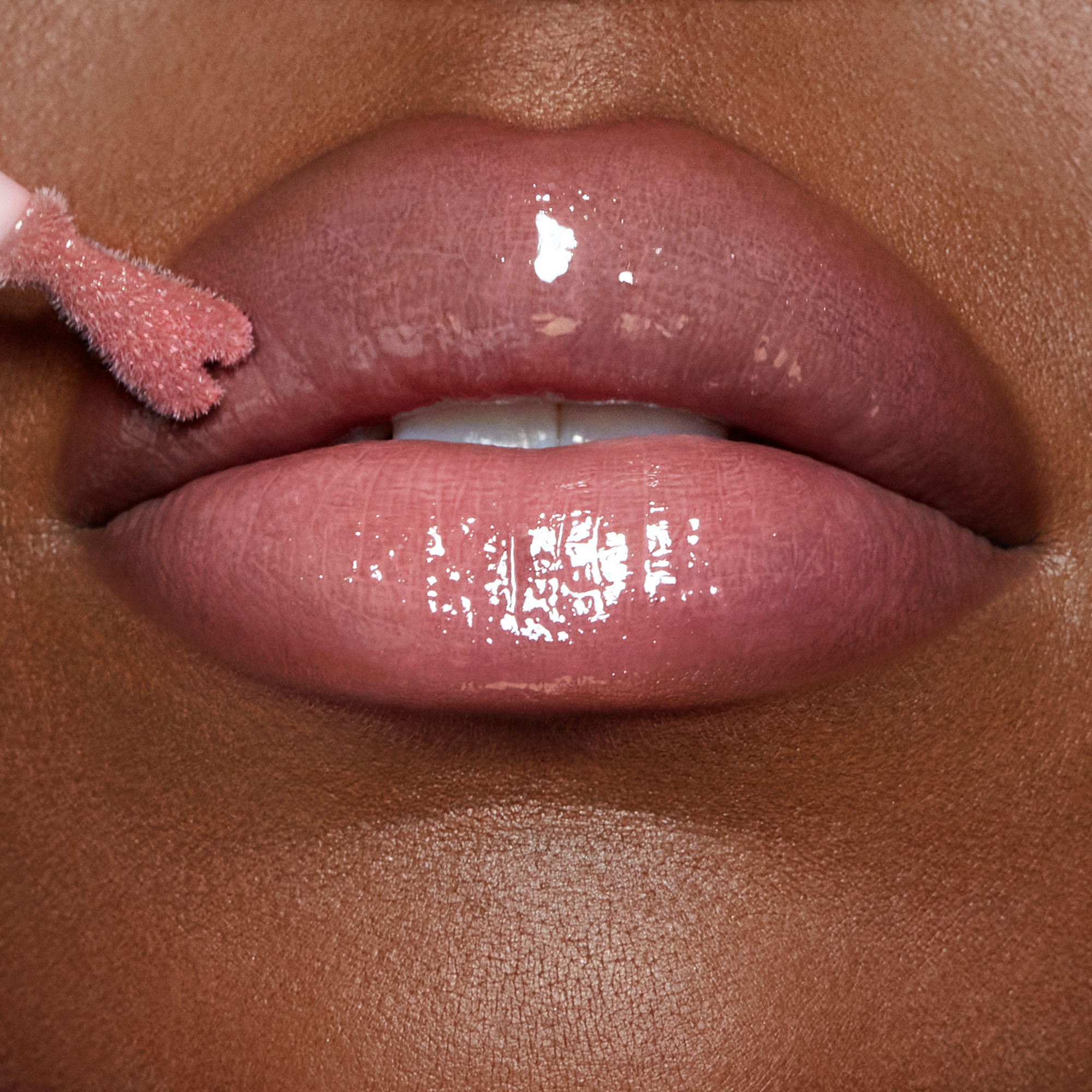 Collagen Lip Bath - Pillow Talk Fair on deep skin tone model