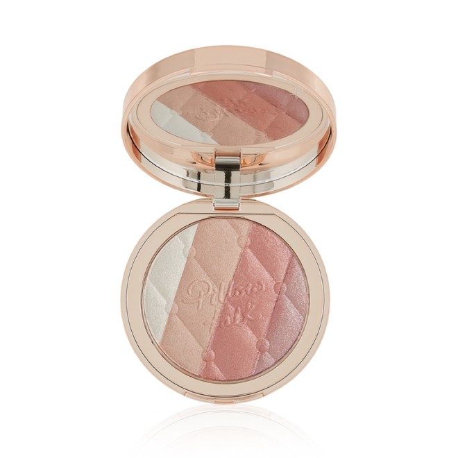 An open, pressed powder highlighter compact, with a mirrored-lid, in various shades of pink and gold for cool-tone complexions. 