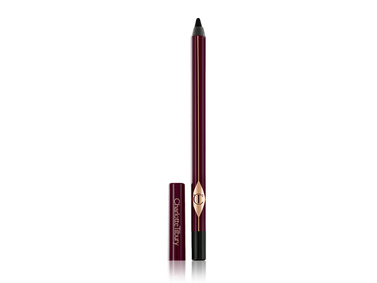 An open black kohl eyeliner pencil with dark crimson-coloured packaging and the lid removed. 
