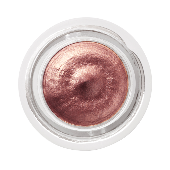 Close-up of a dark rose gold. cream eyeshadow in an open glass pot.