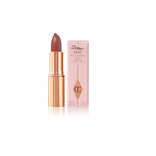 An open, deep berry-rose lipstick with a satin finish in a golden, metallic tube with nude-pink box packaging. 