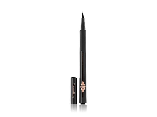 An open, black-coloured eyeliner pen with its cap next to it. 