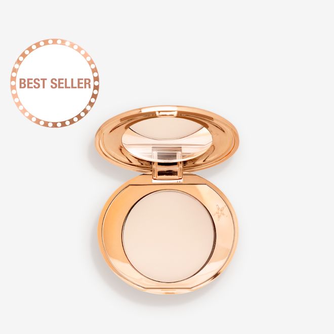 Mini Airbrush Flawless Finish in Fair open An open, mirrored-lid, mini, pressed powder compact in a cream colour.