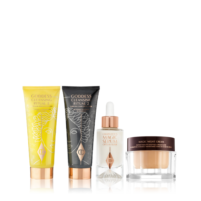 Two facial cleansers, one in lemon-yellow packaging and the other in charcoal-black with a pearly-white face serum in a glass bottle, and a dark champagne-coloured face cream in a glass jar. 