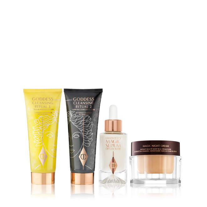 Two facial cleansers, one in lemon-yellow packaging and the other in charcoal-black with a pearly-white face serum in a glass bottle, and a dark champagne-coloured face cream in a glass jar. 