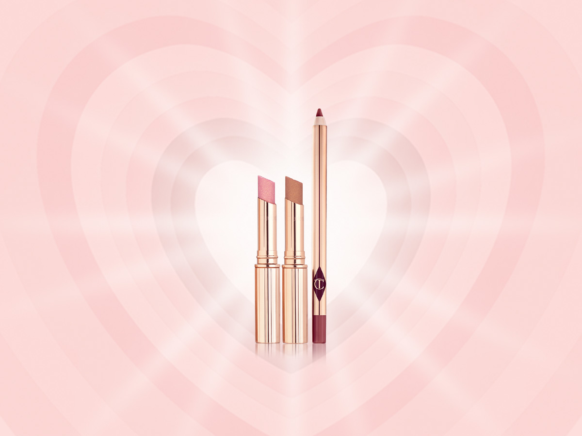 Two, open shimmery lipsticks in sheer pink and nude coppery-bronze colour with a lip liner pencil in a brownish-maroon colour.