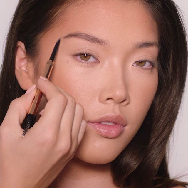 Step 4 in Charlotte's 90s Makeup Look: thin 90s eyebrows