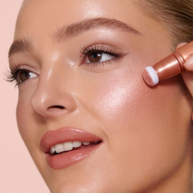 Peachgasm Beauty Light Wand on medium skin