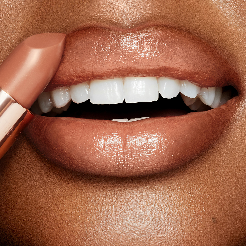 Lip close up wearing Yes Honey Lipstick to create a concealer lips lipstick look