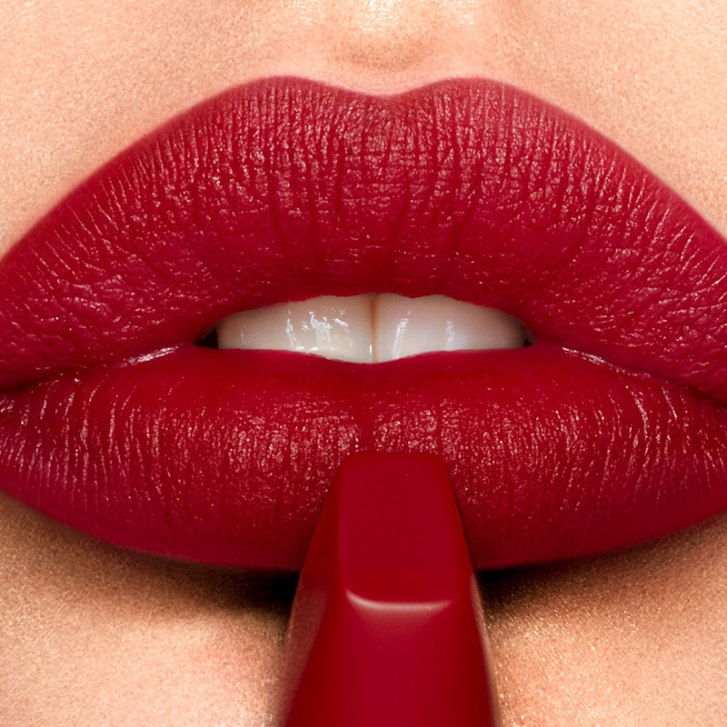 Lip close up of Red Carpet Red ruby red lipstick on fair skin