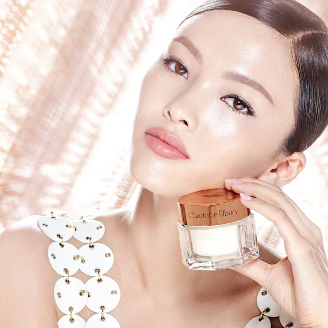 Model wearing Charlotte's Magic Cream Model wearing Charlotte's Magic Cream