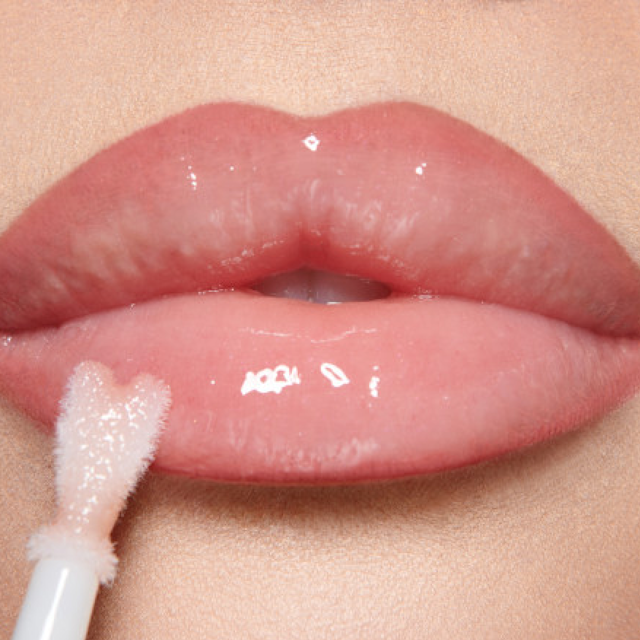 Model wearing Pillow Talk and Refresh Rose lip liner and lip gloss combination