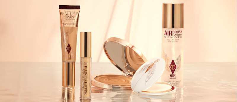 Base de maquillaje, corrector, bronceador, polvos y spray fijador