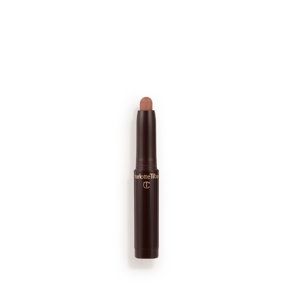 An open cream eyeshadow wand in a cool, nudey-brown matte shade in black-coloured tube.