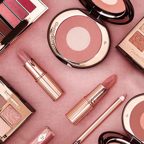 Red carpet makeup including two-tone blushes, nude-pink and berry-pink lipsticks and lip liner pencils, lip glosses, and eyeshadow palettes from the Pillow Talk collection