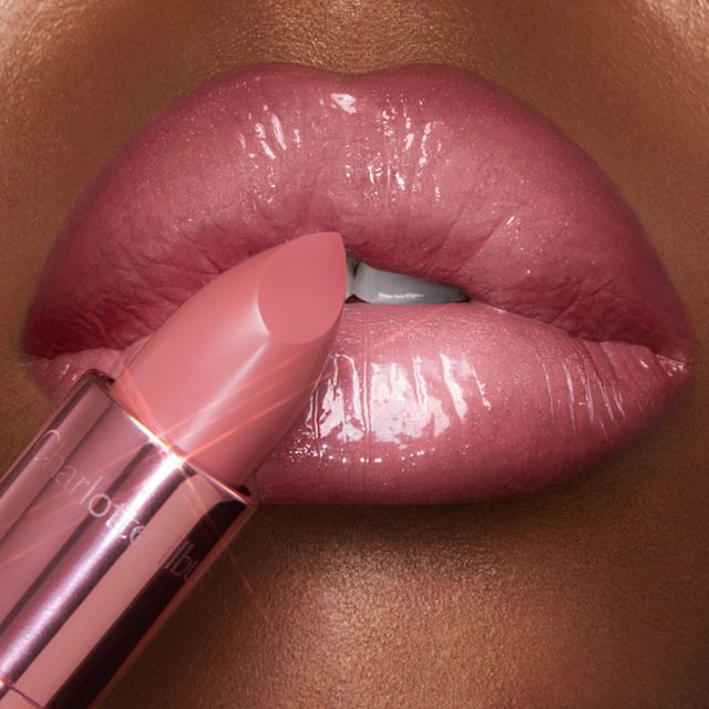Model wearing Supersize Me and Candy Chic lip liner and lipstick combination