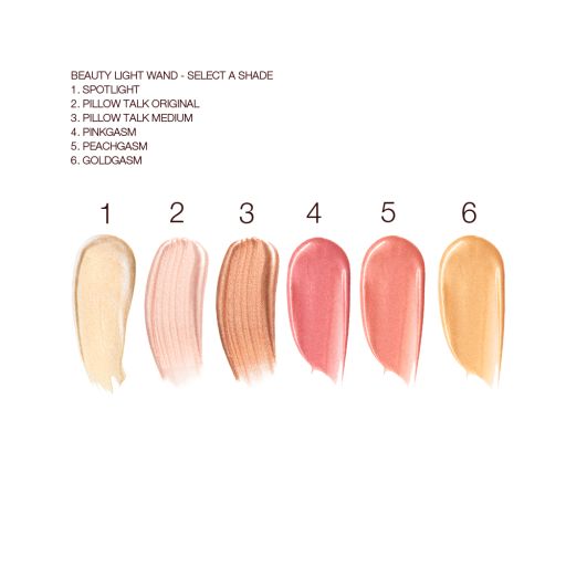 Swatches of six liquid highlighters and highlighter blushes in champagne, rose gold, copper, rose pink, peach, and honey-gold. 