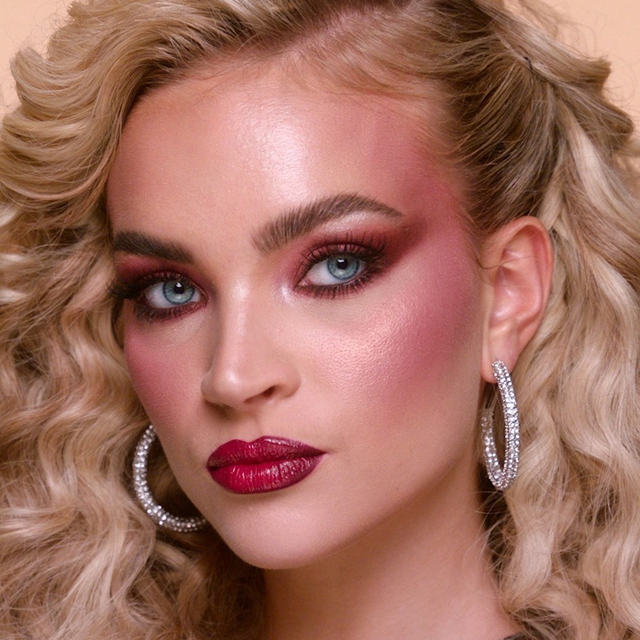 Model wearing an 80s New Year's Eve makeup look