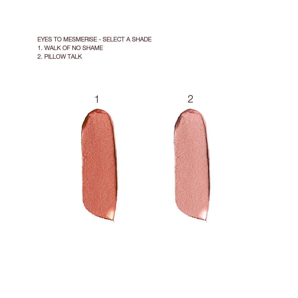 Swatches of two metallic, cream eyeshadows in shades of russet rose and nude pink.