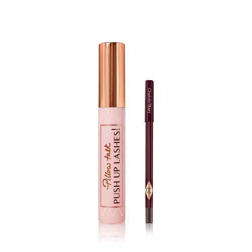 Mascara in a nude pink tube with a gold-coloured lid with Pillow Talk push up lashes! written on the tube along with an eyeliner pencil in a dark berry-brown shade. 