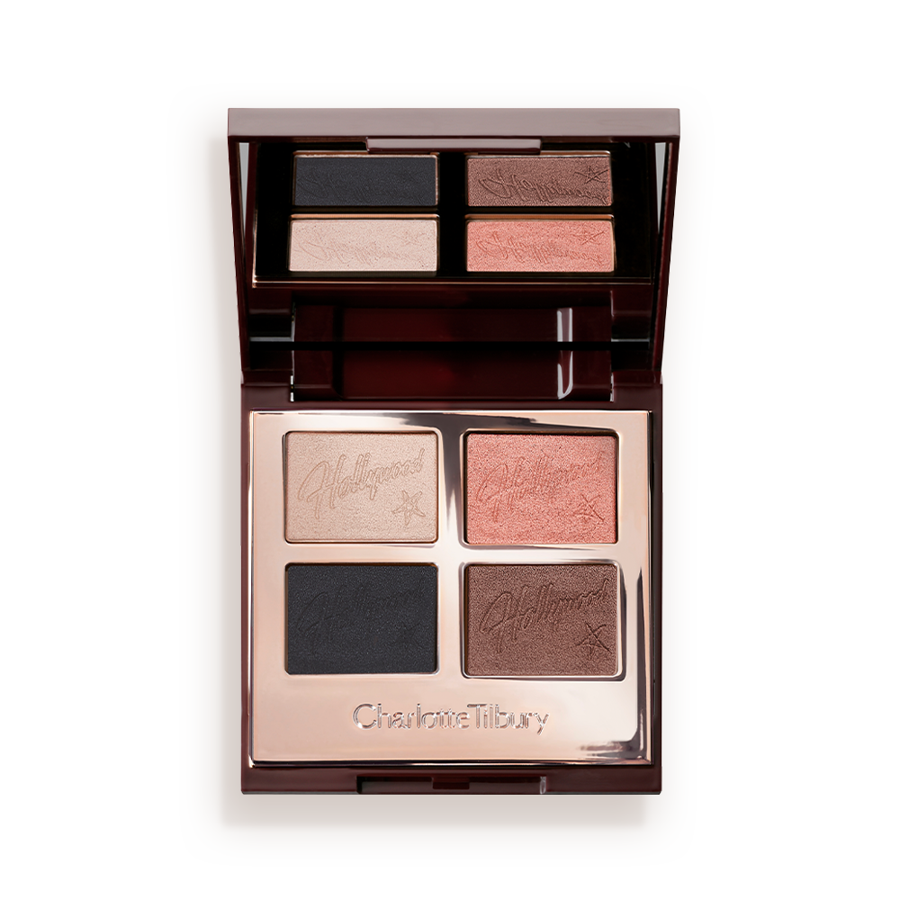 Quad eyeshadow palette with mirrored lid with matte and shimmery eyeshadows in rose gold, chocolate brown, champagne, and black.