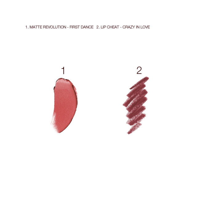 Swatches of a matte lipstick in a warm pink shade and lip liner pencil in purplish-red. 
