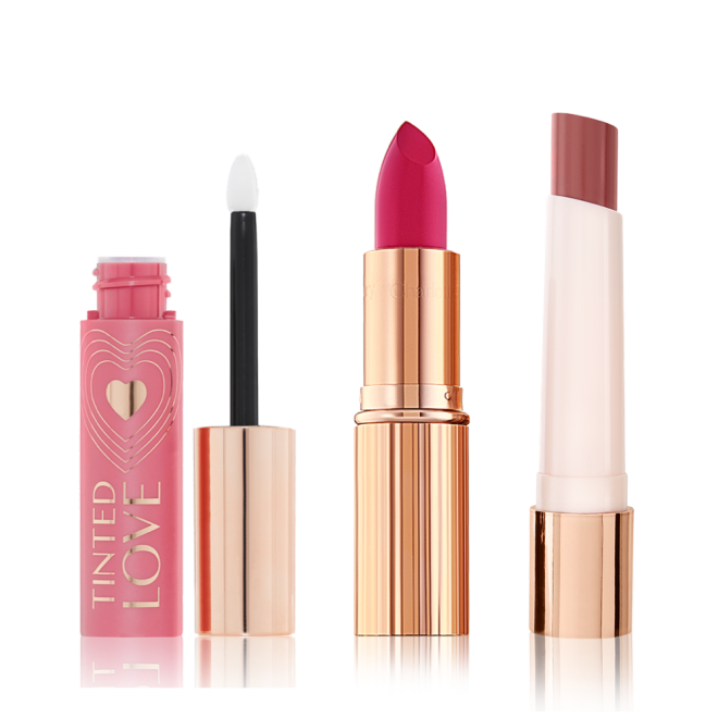 Lips and cheek tint in petal pink with a doe-foot applicator, lipstick in vivid pink in a sleek, gold-coloured tube, and lipstick balm in a reddish brown shade in white and gold-coloured tube. 