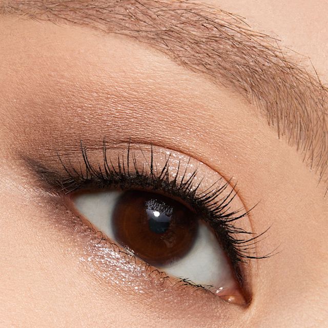 Model eye close up wearing a light brown eyeshadow makeup look using Super Neutral eyeshadow palette