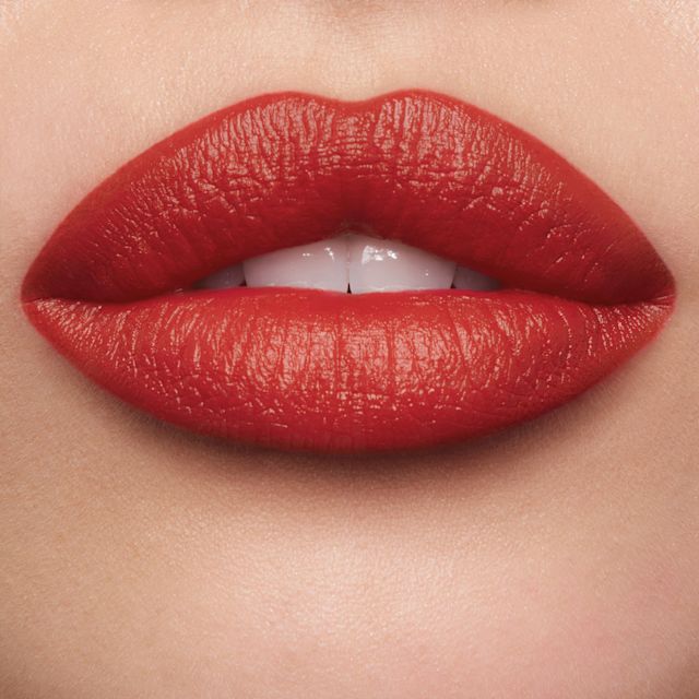 Fame Flame warm-toned, chilli-red lipstick
