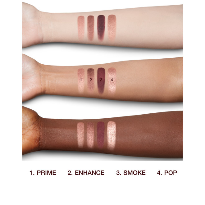 Fair, tan, and deep-tone arms with swatches of four eyeshadows in shades of rose gold and brown. 