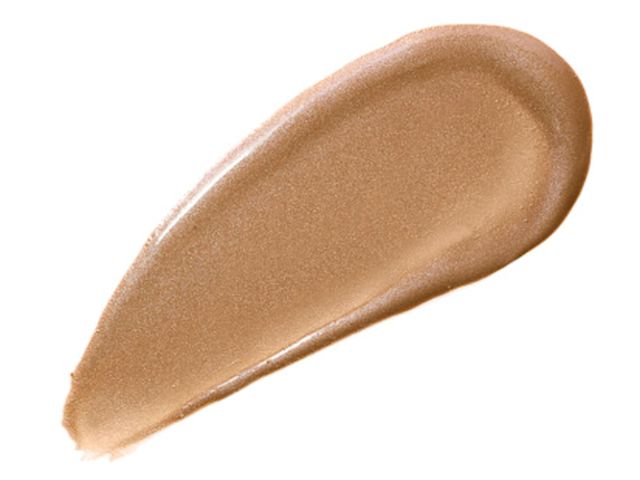 Swatch de un contour líquido en formato wand en un color marrón arena shimmer.