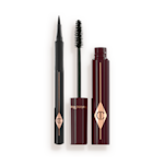An open mascara with its applicator next to it in dark crimson-cloured packaging and an open eyeliner pen in black colour.