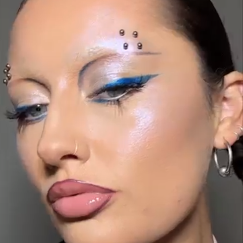 Frankie Darling wearing a futuristic makeup look using Charlotte Tilbury Beauty