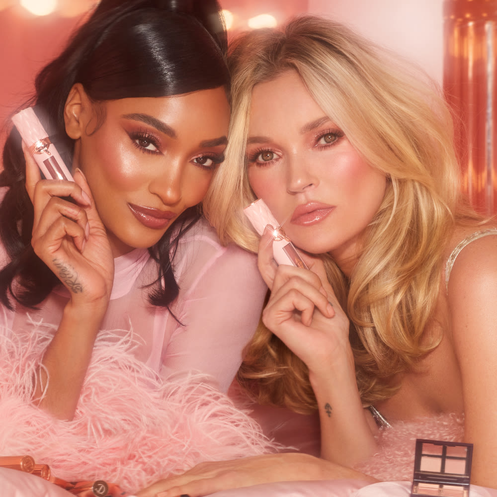 Jourdan Dunn and Kate Moss applying Pillow Talk Big Lip Plumpgasm plumping lip gloss