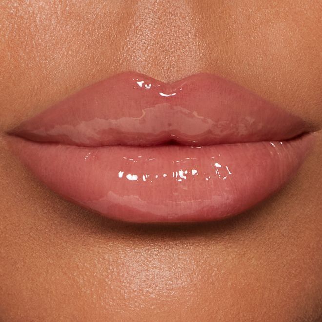 Pillow Talk Big Lip Plumpgasm - Fair/Medium on medium skin tone model Pillow Talk Big Lip Plumpgasm - Fair/Medium on medium skin tone model